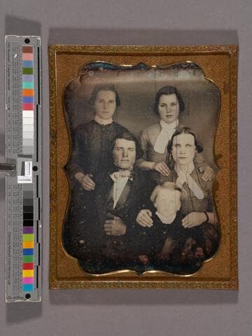 Unidentified family portrait of a woman, two teenage girls, a young man, and a boy