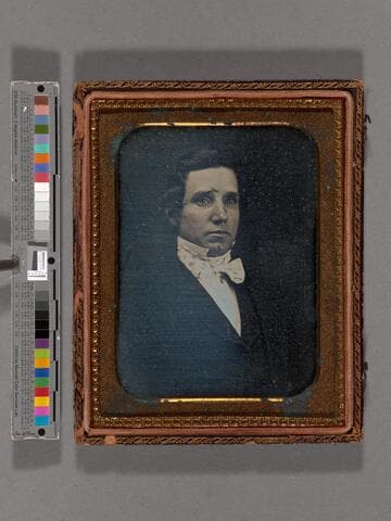 Portrait of seated man, wearing waistcoat and cravat [Wolfe family?]