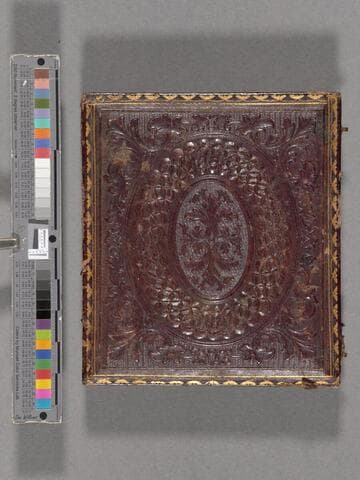 Mrs. Dwight Plympton Conklin wearing dark bracelets and necklace with cross