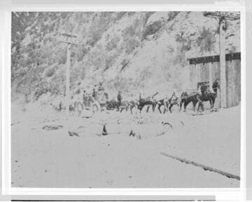 The delivery of material by horse drawn wagon to the building of Santa Ana River #1 Hydro Plant