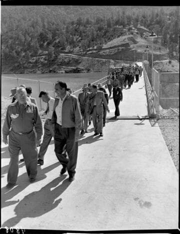 Crowd of people on the crest of Dam 7 touring the dam probably during the dedication of the Big Creek 4 project