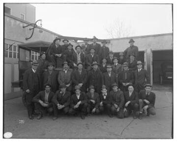 Group shot of men from the Overhead department at an Edison Garage