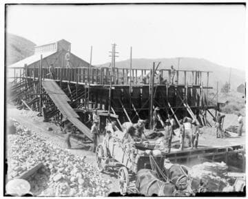 A construction crew at Mill Creek #3 Hydro Plant finishing the West wall