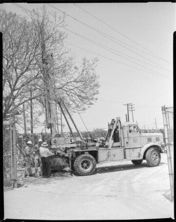 Auger on truck drilling for pole placement