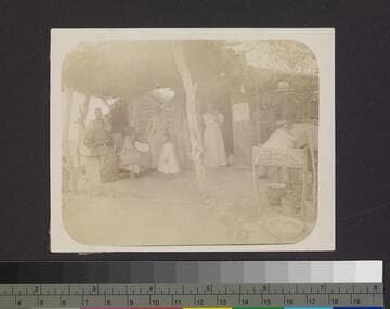 Family in front of home