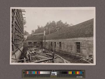 Huntington Library Construction: view showing the east side of the West Wing, the north side of the Main Building, and the west side of the Center Wing