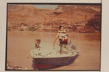 Ed l'Anson in the "Bootoo."  Camp at Mile 70.  Ed was the FIRST man to go through the Grand Canyon wearing a plug hat