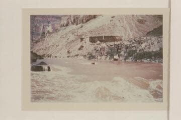 Approach of inboard motor boat to Vulcan Rapid.  Piloting is Dock Marston and Willie Taylor with Joe Desloge are the passengers