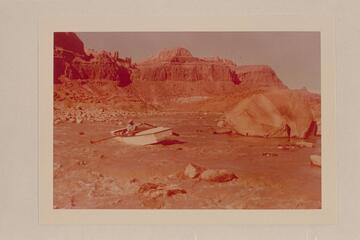 Norm Nevills hung up in Piute Rapid