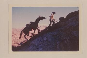 Dan Lehi and horse up trail east of Dead Center Camp on return from mouth of Nasja Creek