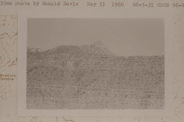 Osiris Temple looking east from saddle between main and north summits of Ra.  The light grey slope in upper center and to left of the summit block is a shattered mass of Kaibab and/or Toroweap