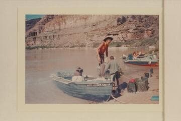Bob Malott steps ashore at Whitmore Beach.  Bob is partially costumed as Bradley