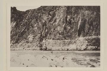 Weatherhead of the Eddy party studies Specter Chasm Rapid