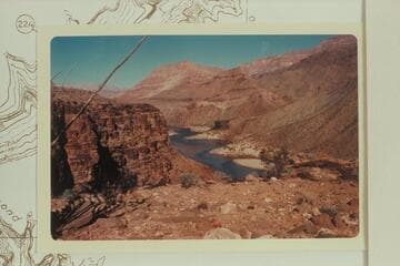 Up from about Mile 222.7 showing the basalt remnant above mouth of 222 Mile Creek and the tilted strata above it