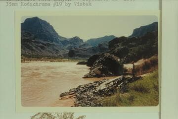 Down and across the river from mouth of 209 Mile Canyon to Granite Park Canyon
