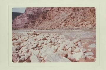Cataract Canyon Rapid No. 43 which heads at Mile 184.1 and drops 7 ft. in 15/100 miles