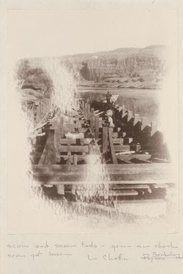 The scow under construction.  The scow was used during the building of the dredge.  It was pulled by lines from the lower to the upper bar to carry the freight