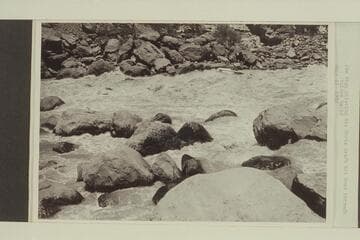 Jim Rigg piloting his Chris Craft kit boat through Vulcan Rapid