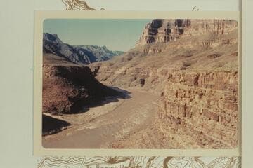 Down at head of Granite Spring Rapid,  Mile 220.5.  Three members of the party stand at the edge of the cliff over the rapid