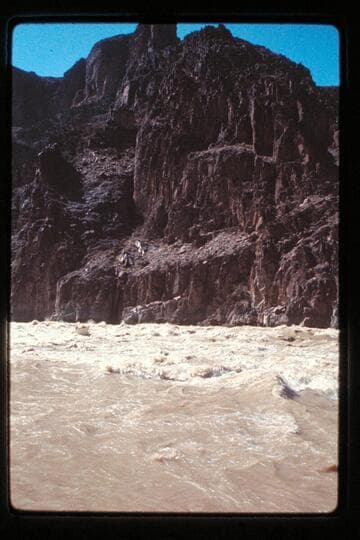 "Wee Red" climbs Monument Creek Rapids