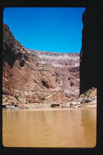 Chopper takes off from Marble Canyon Dam site
