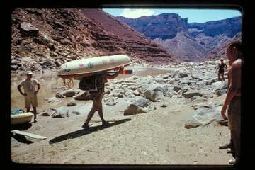 Bill Belknap portages at Soap Creek