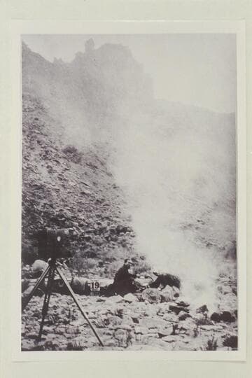 Russell sitting by the fire.  The party was in the middle of Cataract Canyon