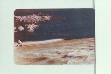 Dave following streamer entrant to 187 1/2 Mile Rapid, Cataract Canyon.  In making the pring, the boat was cut off the left side