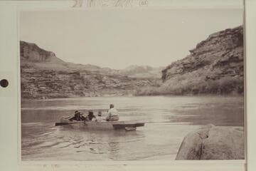 Pilgrimage to a Shrine--Hole-in-the-Rock.  The horse pilgrims from Bluff cross the river to Hole-in-the-Rock after riding out over old trail from Bluff.  Up river to Jackass Bench at left