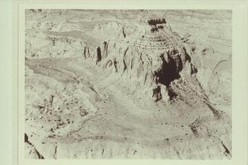 Arch in the Sky; Octagon Butte; Cummings Mesa.  Navajo Reservation.  This view shows the opening back of the arch