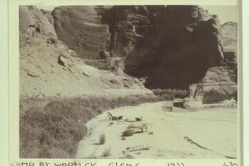 Camp at Warm Creek--Glen Canyon.  RB-MV Expedition.  Photo 670.  Warm Creek is Mile 27.8.  Horses in brush used for steamer construction