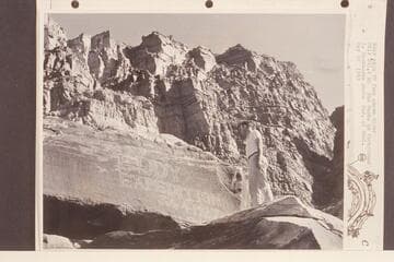 Eddy sign 70 ft. above river.  Mile 203.2 right bank.  Bud Rusho in foreground