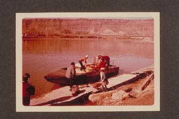 Loading the Sportyaks on Tex McClatchy's jet boat for ferrying to the head of Cataract Canyon.  Above the highway bridge at Moab
