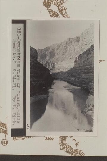Down to 30 Mile Damsite.  Photo in LaRue album 1.  Camera is at Mile 186.4 right bank.  The fan and riffle at center are at mouth of Cove Canyon at Mile 186.2.  This riffle is the one which Stanton dramatized when he announced quitting the survey