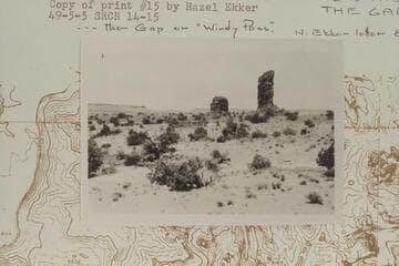 Two of the standing rocks near Lizard Rock or The Moon.  The near rock is The Wall.  The Gap in distance.  "The Gap or Windy Pass"--Hazel Ekker letter, 1966, Aug. 13