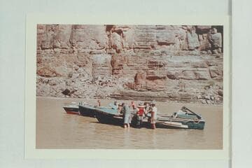 The boats on the sandbar in the eddy at National Canyon
