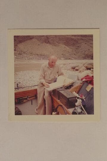 Jim Algar studies the script for the making of Disney's "Ten Who Dared."  Grand Canyon