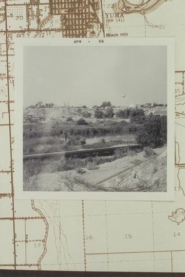 From west end of bluff looking northeast across old rail bridge site