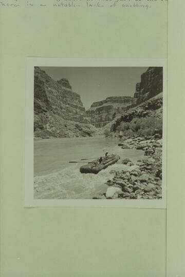 10.  Beginning run of Lava Falls.  Lining Pontoon No. 2.  Boat:  Al and Smuss.  Shore:  Dick, Harry, Clarke, Jack, Bruce and Doug