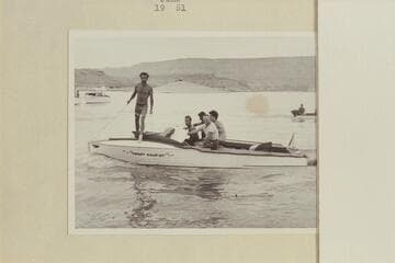 The "Sweet Chariot" at Pierces Ferry.  Left to right:  Daniels; Cooper; Seymour; Taylor; and Maradel Marston.  Grand Canyon Motor Traverse