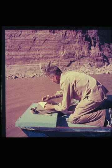 Hugh Cutler pressing plant specimens below Vaseyes [sic] Paradise