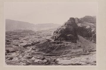 Butte 5070 at north end of eastern branch of Cummings Mesa.  The slope of Navajo Mountain is upper left