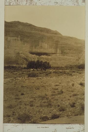 Camp of the Glen Canyon party organized by LaRue.  Identified by Hiett White as Grand Gulch