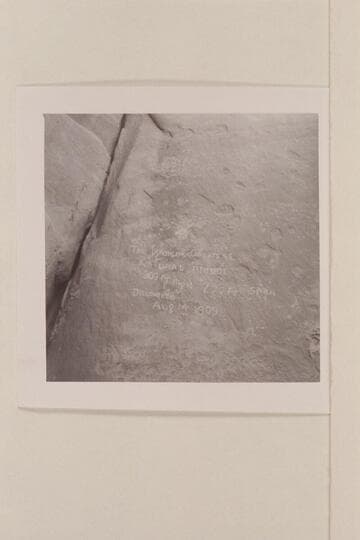 Inscription on leg of Rainbow Bridge reading:  "The Worlds Greatest Natural Bridge, 309 ft. high, 277 ft. Span, Discovered and Surveyed Aug. 14, 1909"