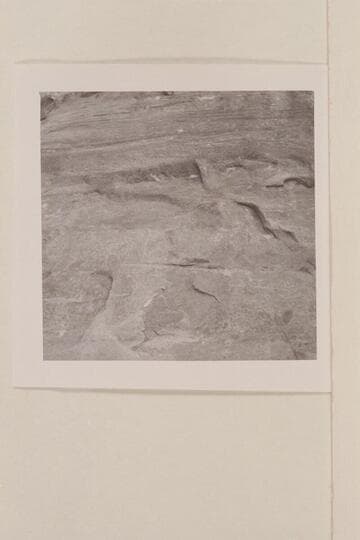 Direction sign scratched in wall at mouth of Bridge Canyon