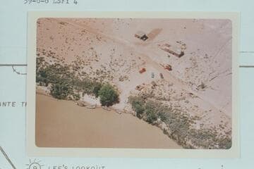 The Fort and storehouse at Lees Ferry with the gear for the Marston-Disney cruise on the beach and at the river bank