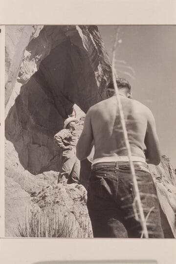 Masland being photographed by Jorgen Visbak.  Arch in the Sky