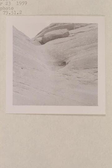 Small water course draining into southwest fork of 73 between the trail entering from the south and the dropoff of 20 ft