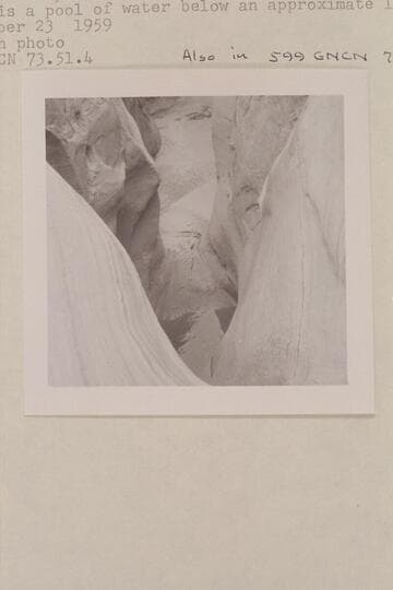 Down the dropoff in the southwest fork of 73.  There is a pool of water below an approximate 15-20-ft. drop.  Also in 599 GNCN 73.52.12