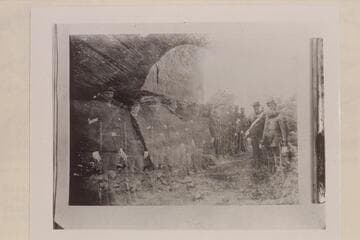 Copy of print owned by Peter Orrin Barker, Escalante, Utah, showing the window in Davis Gulch off the Escalante River.  A double exposure put the Cannonville Militia on the same print